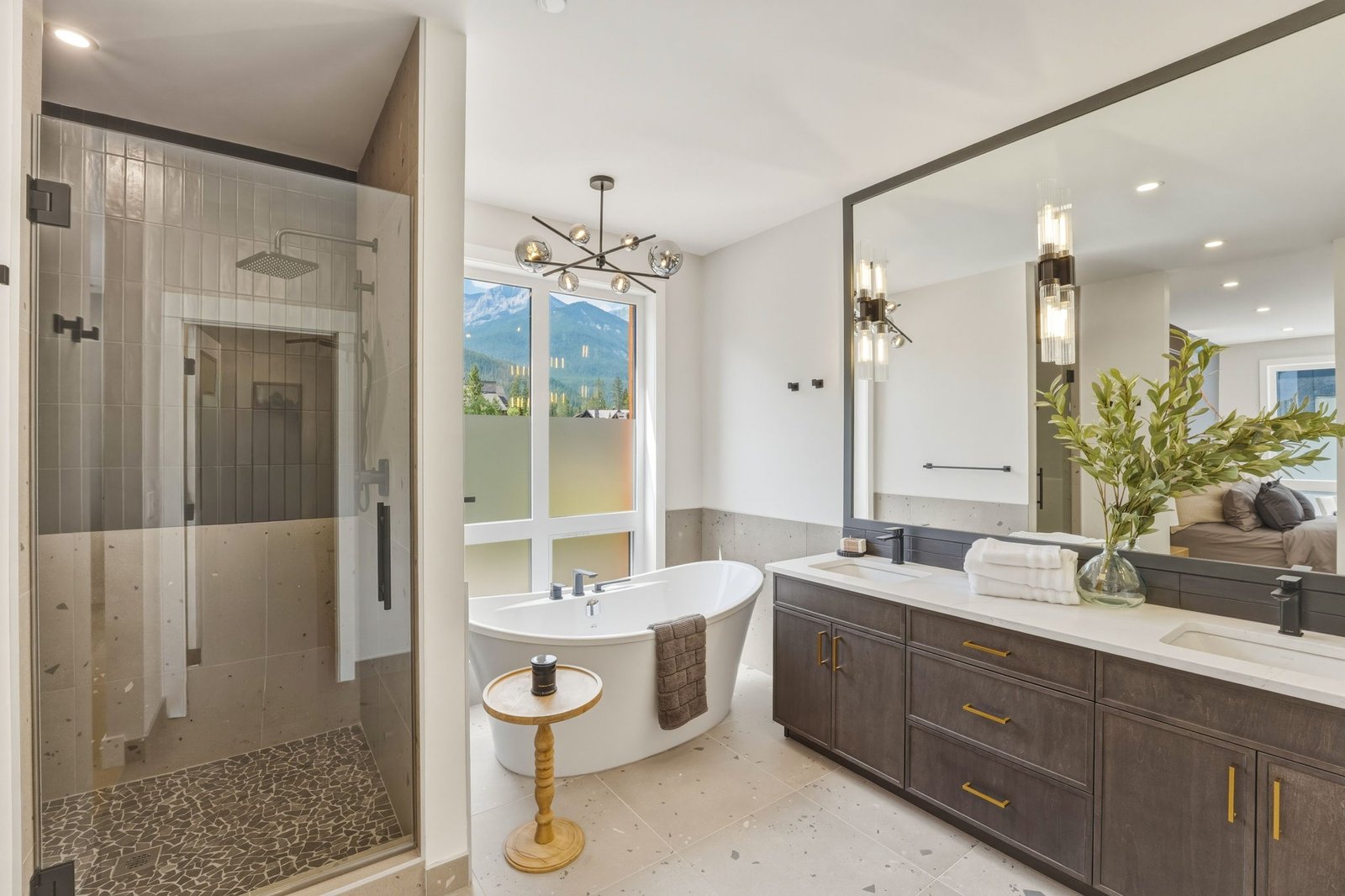 Ensuite bathroom with freestanding tub in a completed Summit Collection residence